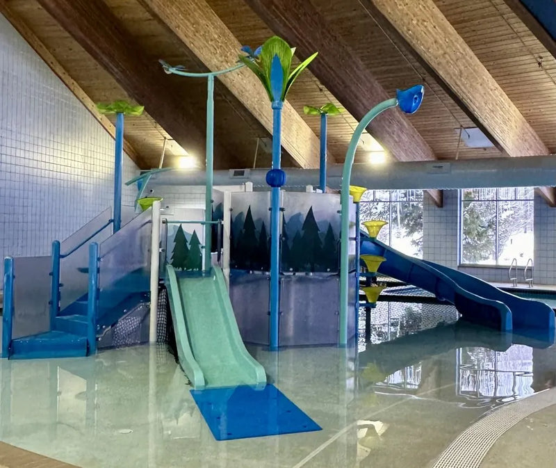 Indoor water park with slides and pool area